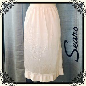 Vintage silky white half slip with lace trim hem